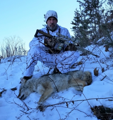 We don't just talk about guns.  7:00 AM 28 February 2015, temp was -18.  Training Area A2  Female coyote about 40 lbs.