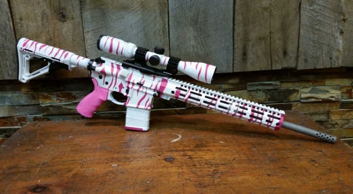 300 Blackout AR15 with Curvy Girl camo scheme in Bright White and Sig Pink.  Brake is a Shrewd brake turned to barrel diameter.